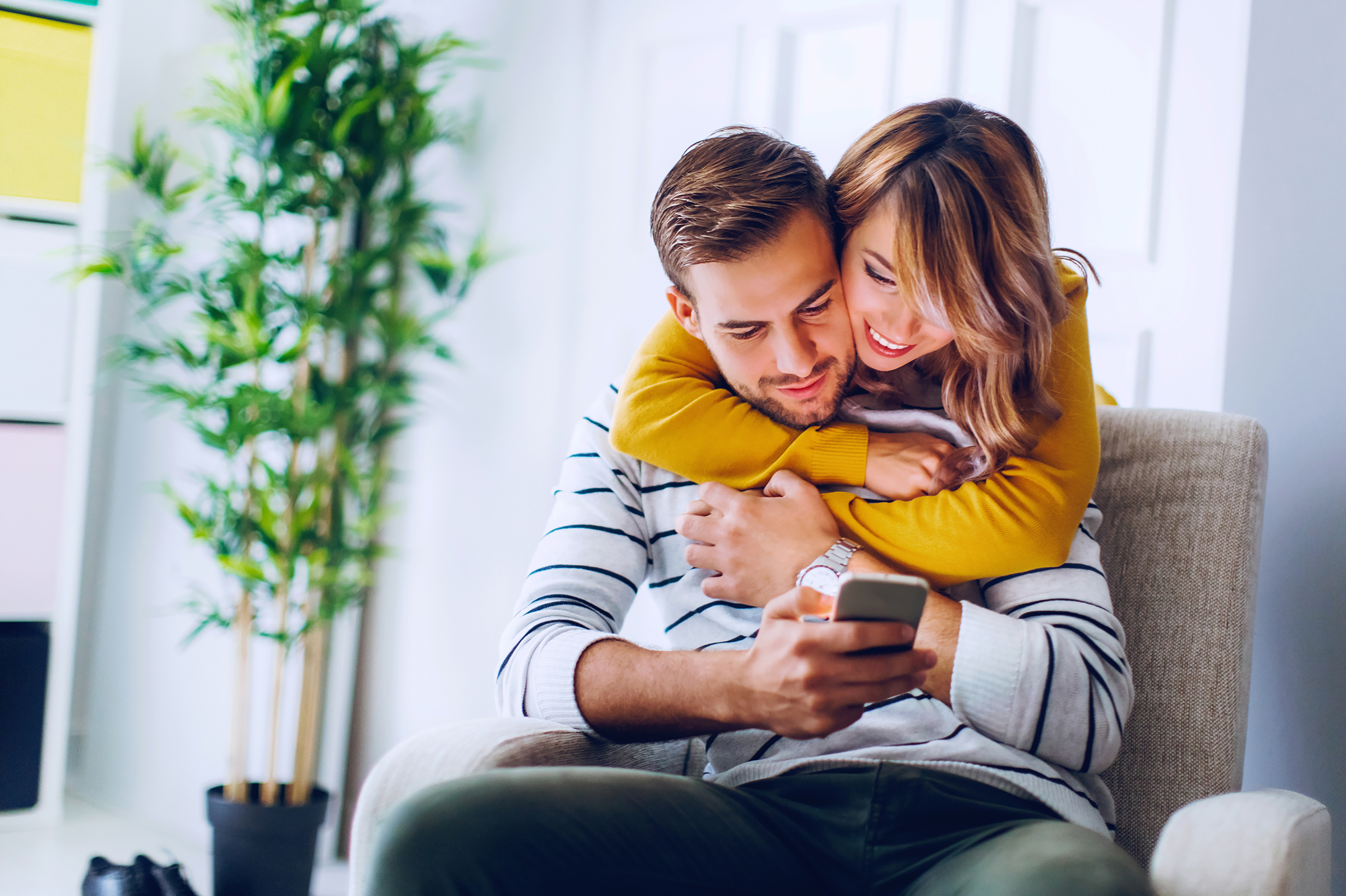 Couple Viewing Mobile